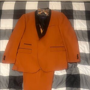 Elegant Orange Tuxedo with Black Accents